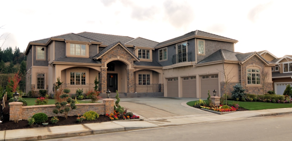 home modern one story residence with integrated solar panels and wood accents.jpg